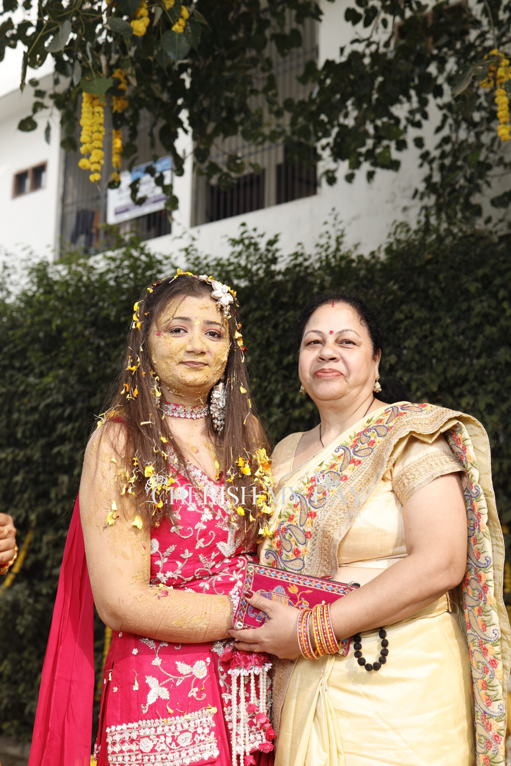 Romantic couple photoshoot with elegant floral backdrop